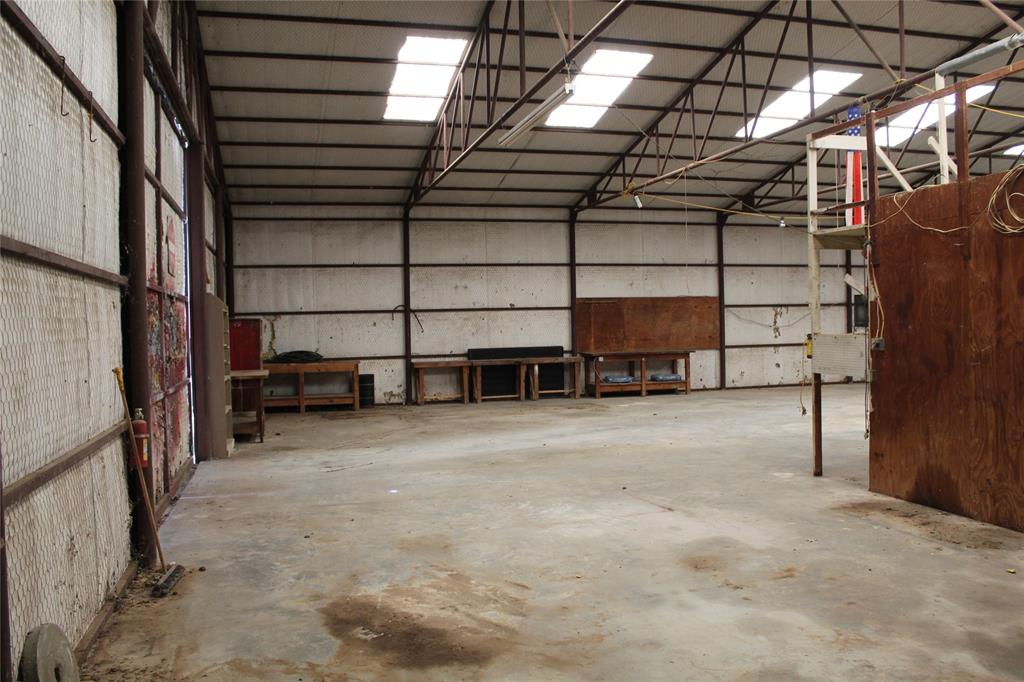 278 County Road 4460 Decatur, TX 76234 - Photo 14 of 19 a view of a room with racks on the wall
