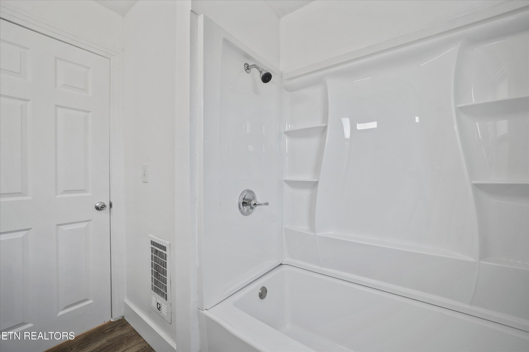 3001 Buffat Mill Road Knoxville, TN 37917 - Photo 11 of 28 a bathroom with a bathtub and a shower