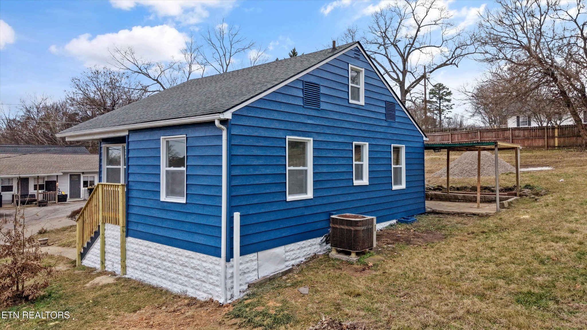 3001 Buffat Mill Road Knoxville, TN 37917 - Photo 24 of 28 a view of a house with a yard and wooden fence