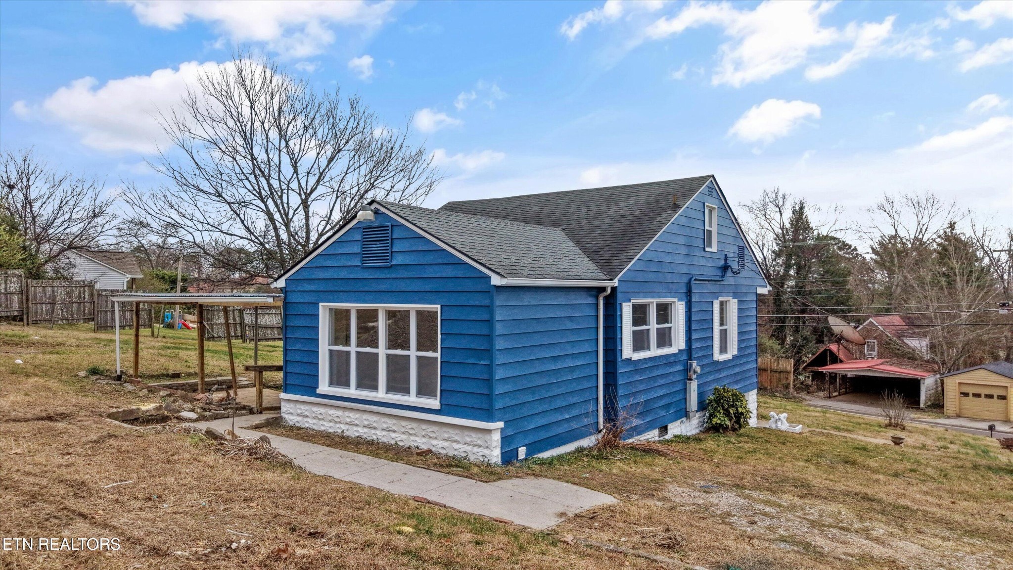 3001 Buffat Mill Road Knoxville, TN 37917 - Photo 26 of 28 a view of a house with a yard