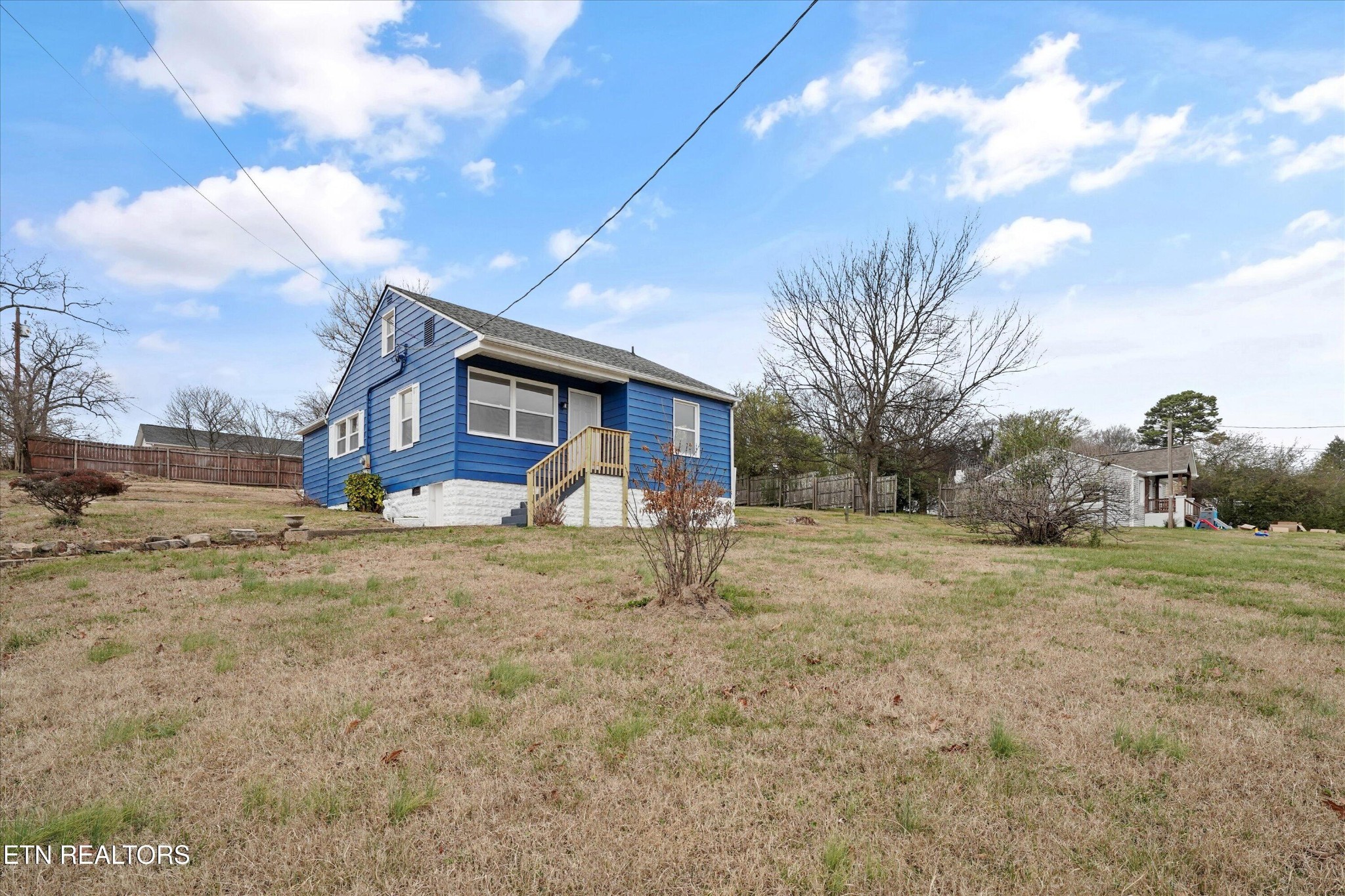 3001 Buffat Mill Road Knoxville, TN 37917 - Photo 3 of 28 a front view of a house with a yard