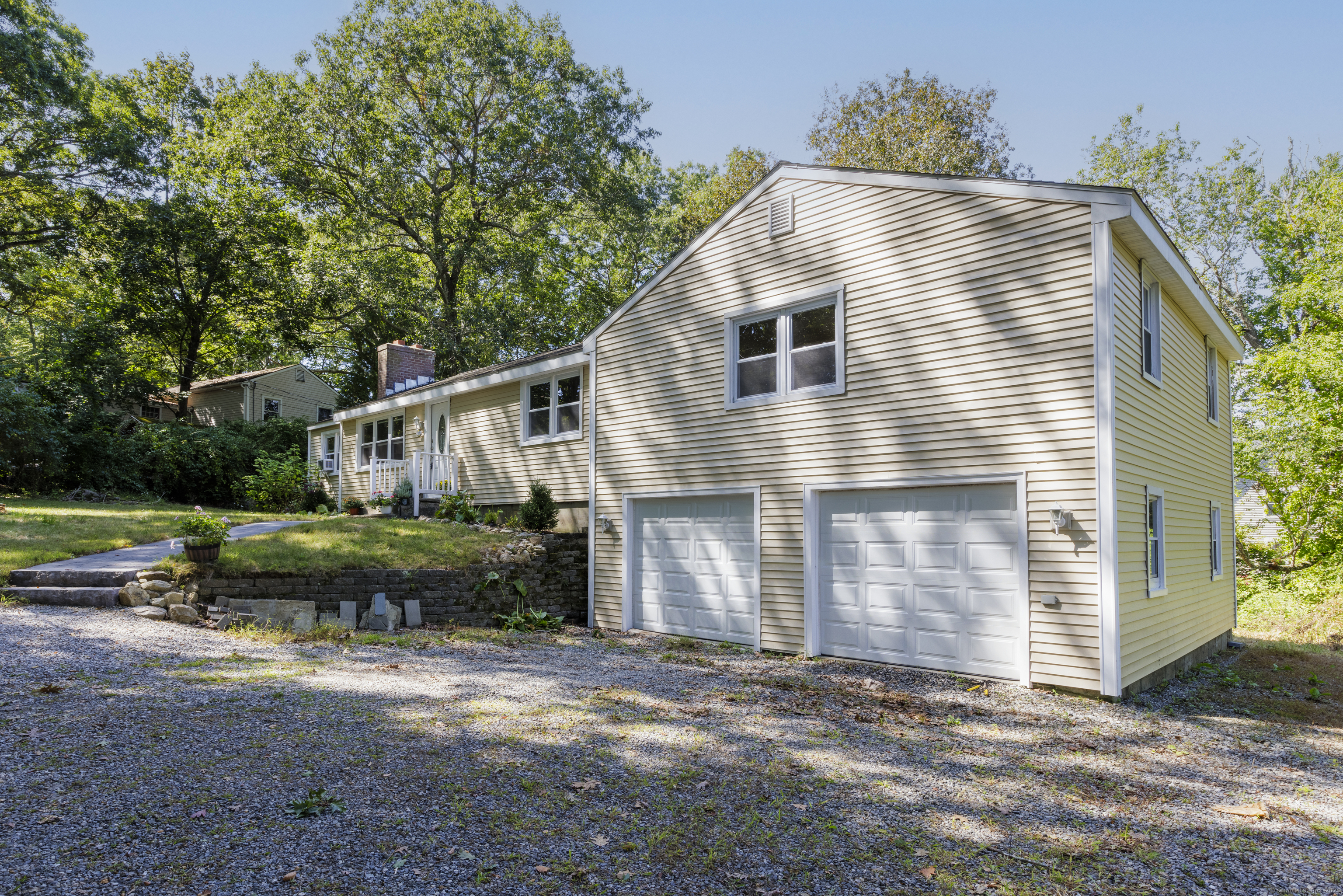 239 A Rockledge Road Lyme, CT 06371 - Photo 4 of 30 a front view of a house with a yard