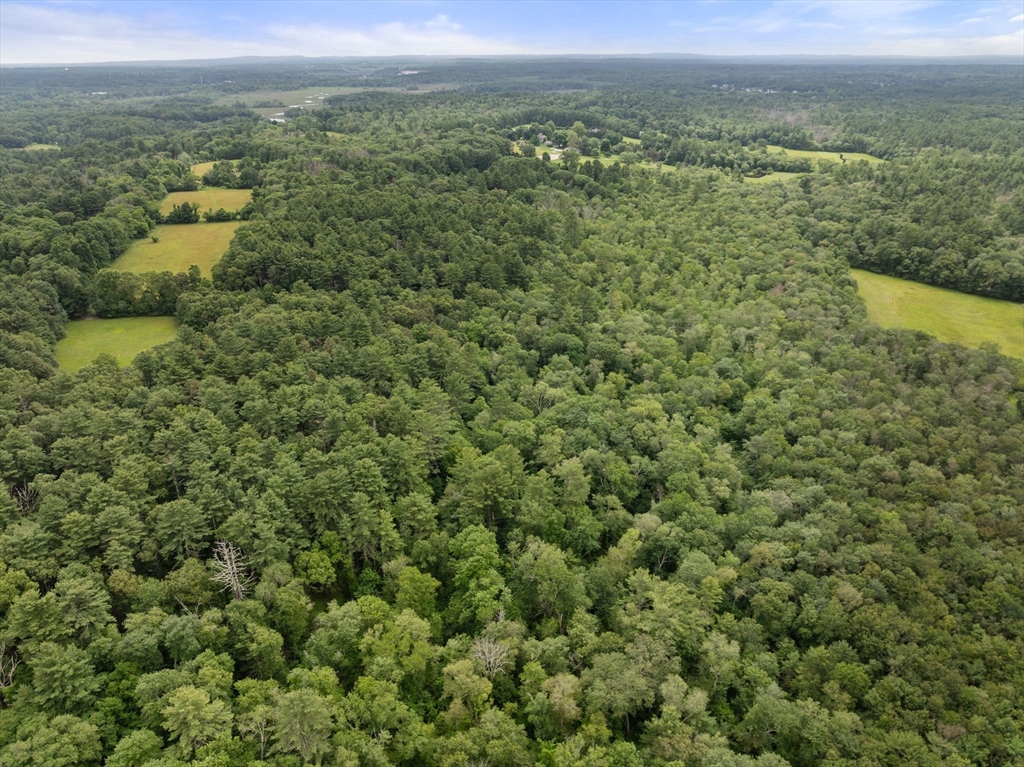 0 South Main Street Sherborn, MA 01770 - Photo 13 of 14 an aerial view of residential houses with outdoor space and trees