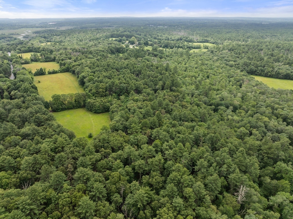 0 South Main Street Sherborn, MA 01770 - Photo 5 of 14 an aerial view of residential houses with outdoor space and trees