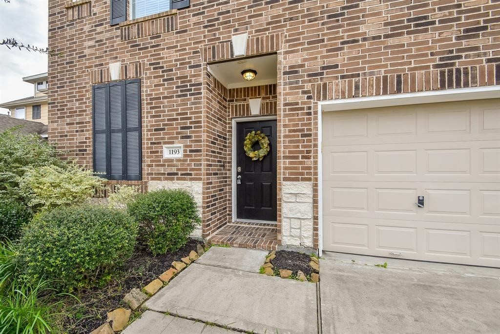 1193 Stallion Ridge Alvin, TX 77511 - Photo 2 of 14 Welcoming walkway to this adorable Texas Home