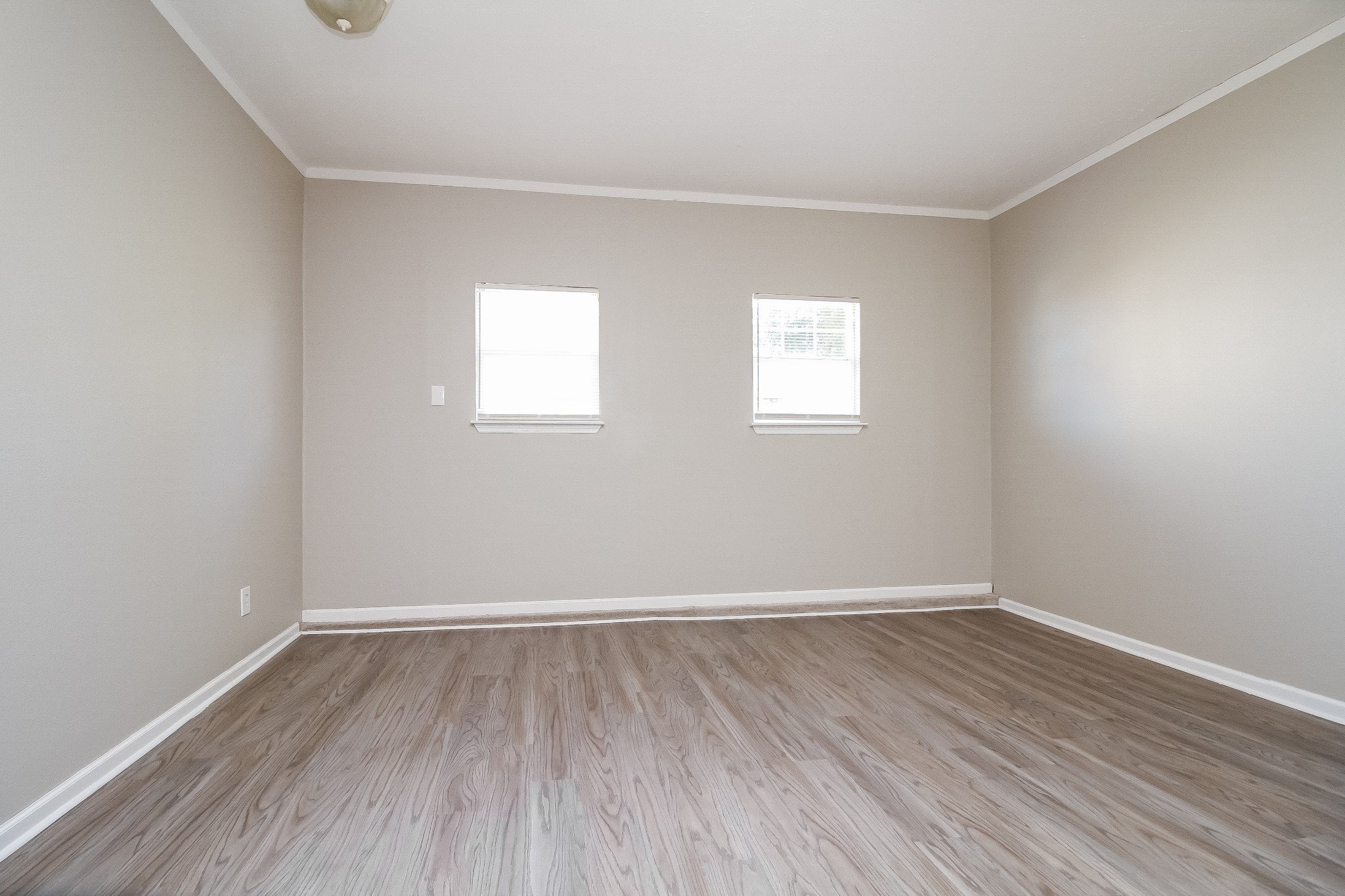7015 Zither Lane La Vergne, TN 37086 - Photo 11 of 17 wooden floor in an empty room with a window