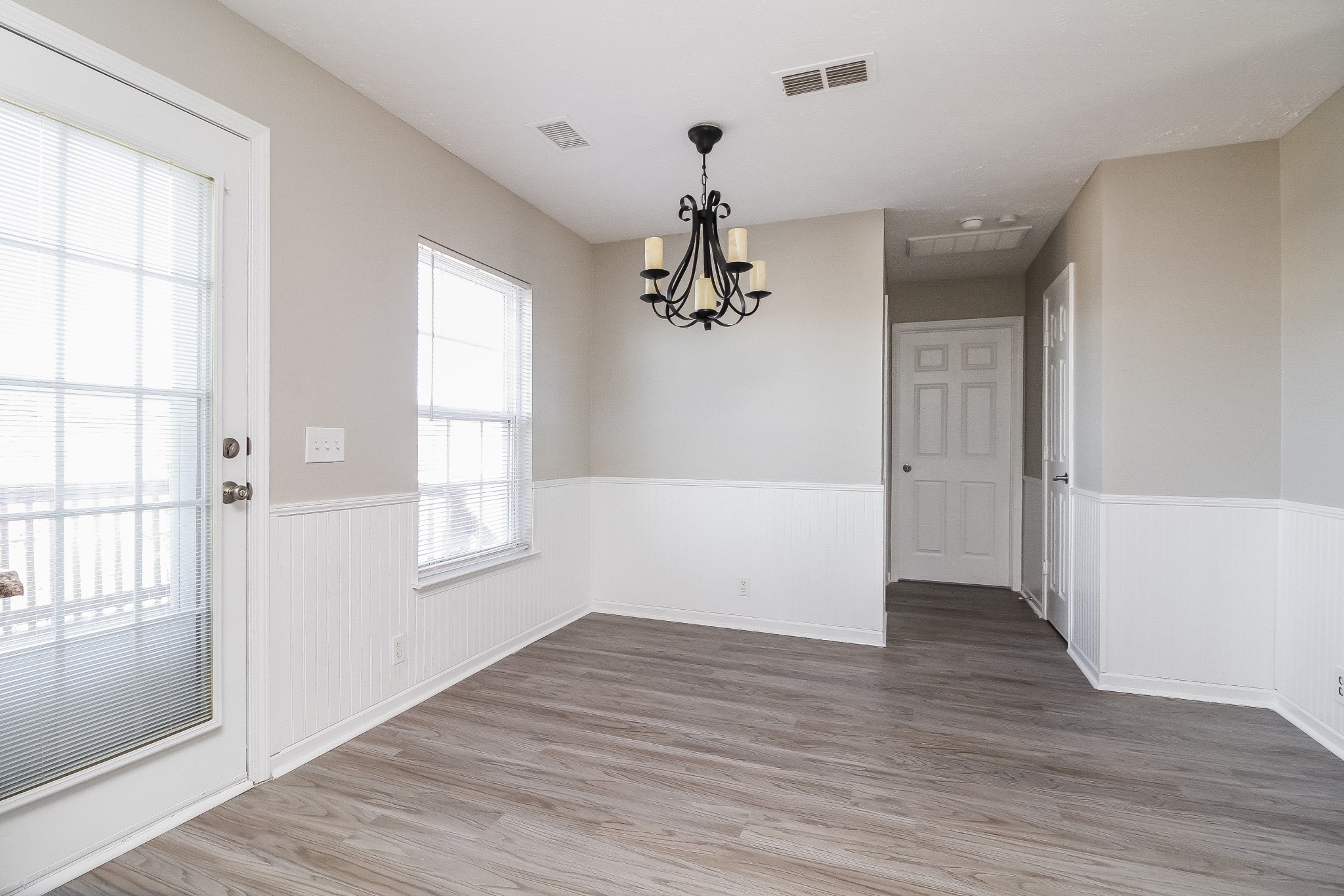 7015 Zither Lane La Vergne, TN 37086 - Photo 5 of 17 wooden floor in an empty room with a window