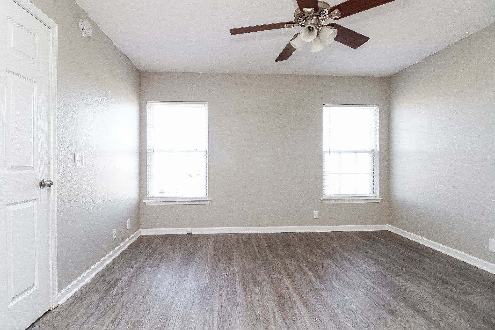 7015 Zither Lane La Vergne, TN 37086 - Photo 8 of 17 wooden floor in an empty room with a window