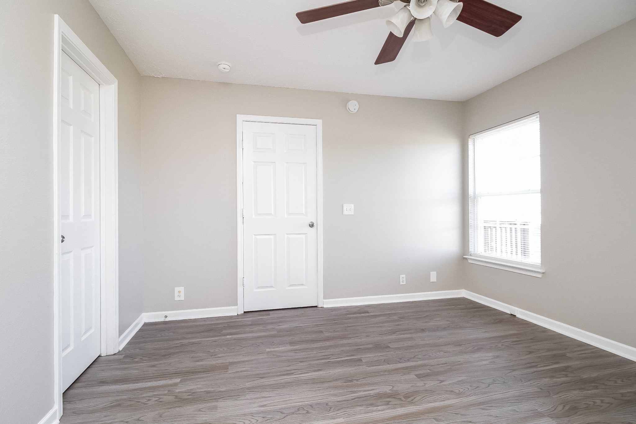 7015 Zither Lane La Vergne, TN 37086 - Photo 9 of 17 wooden floor in an empty room with a window