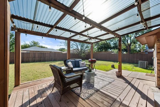 a view of patio with swimming pool