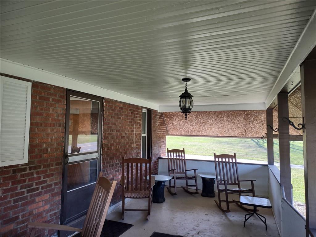 857 Mercer Grove City Road Mercer, PA 16137 - Photo 15 of 22 a view of a livingroom with furniture and a window