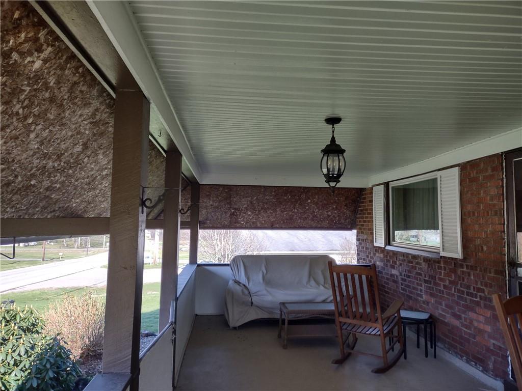 857 Mercer Grove City Road Mercer, PA 16137 - Photo 16 of 22 a bedroom with furniture and a window