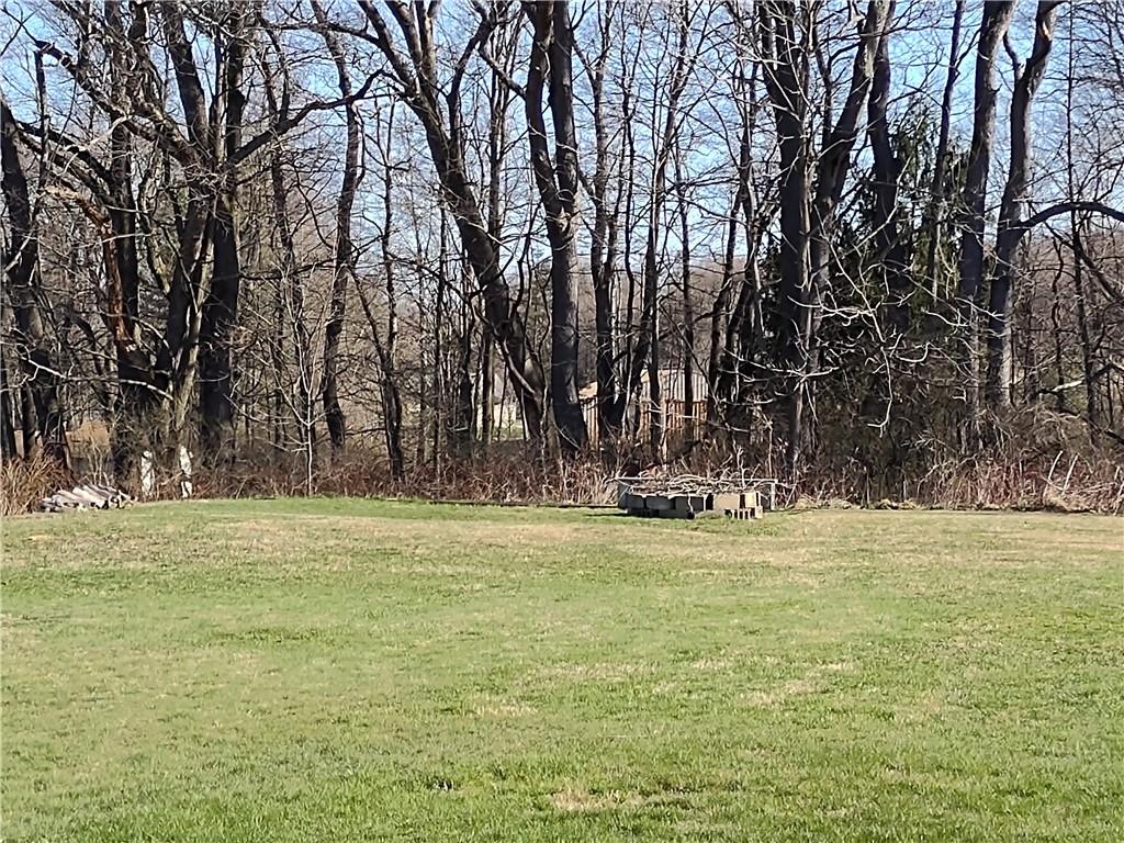 857 Mercer Grove City Road Mercer, PA 16137 - Photo 21 of 22 a view of a swimming pool and trees in the background