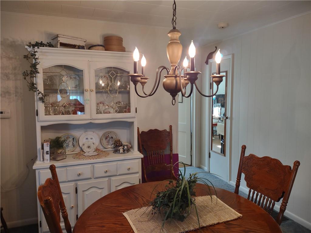 857 Mercer Grove City Road Mercer, PA 16137 - Photo 8 of 22 a view of a dining room with furniture