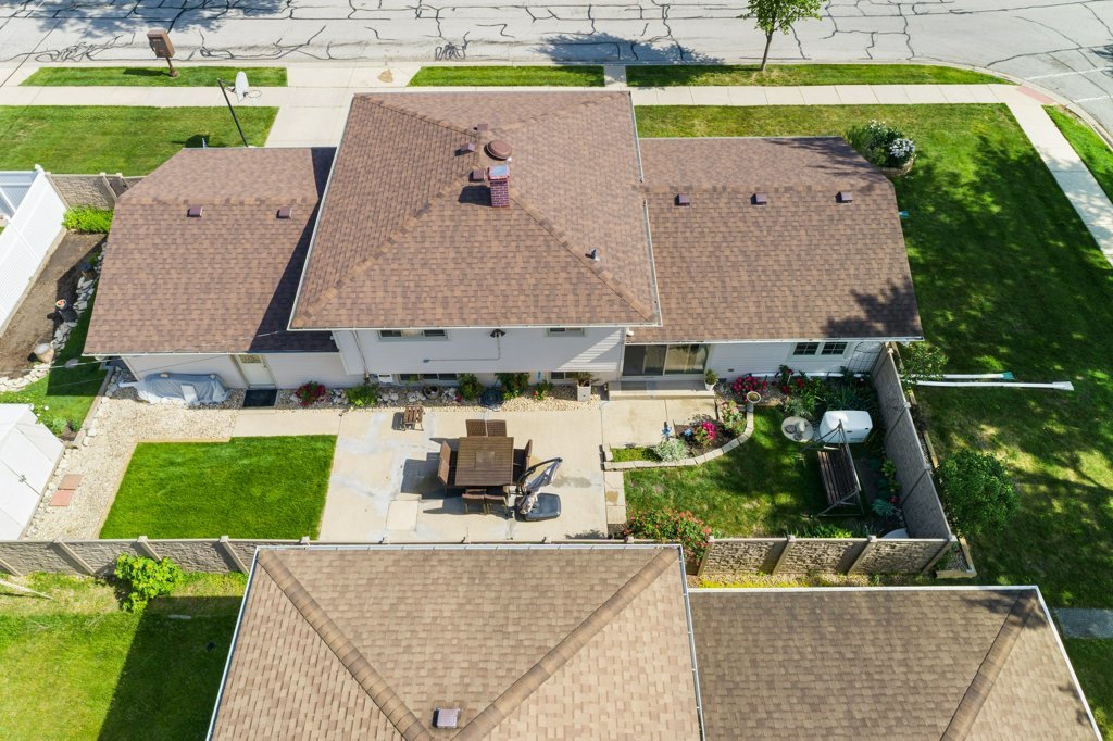 365 West Myrick Avenue Addison, IL 60101 - Photo 43 of 49 an aerial view of a house with a garden and swimming pool