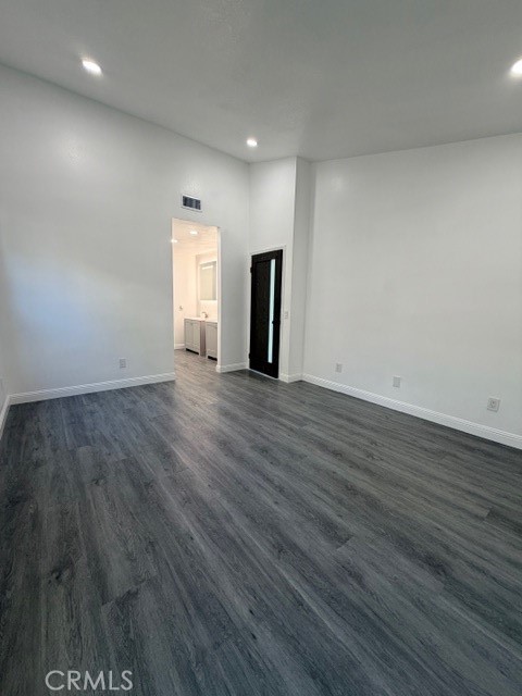 14744 Marymount Street Moorpark, CA 93021 - Photo 16 of 32 a view of empty room with wooden floor