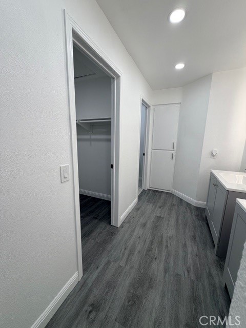 14744 Marymount Street Moorpark, CA 93021 - Photo 19 of 32 a view of a hallway with wooden floor