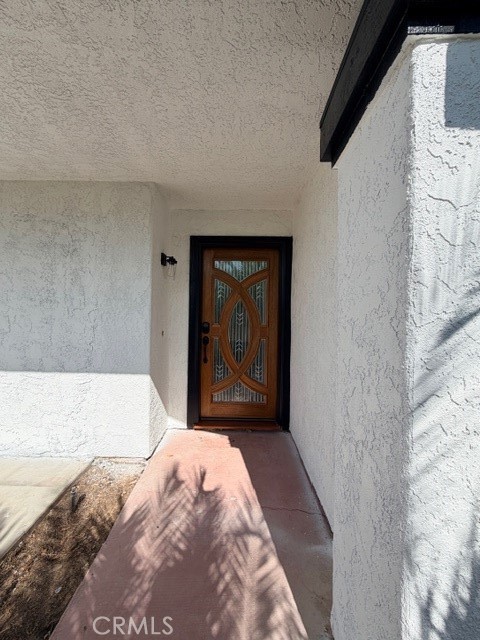 14744 Marymount Street Moorpark, CA 93021 - Photo 28 of 32 a bedroom with a bed and painting on the wall