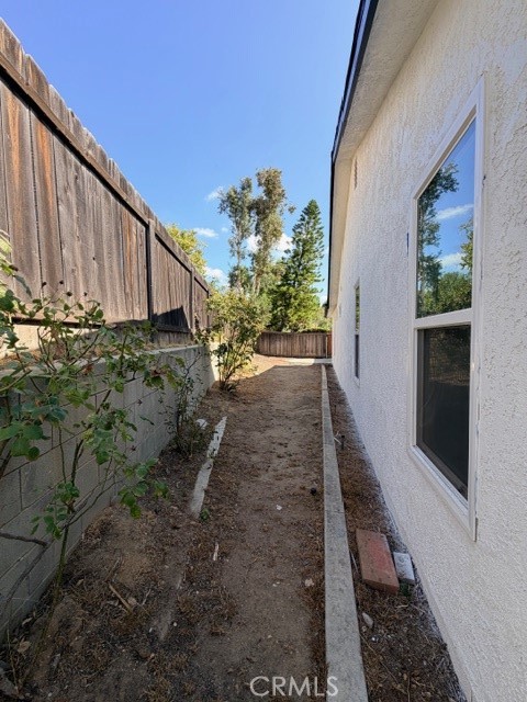 14744 Marymount Street Moorpark, CA 93021 - Photo 30 of 32 a view of a backyard with pathway