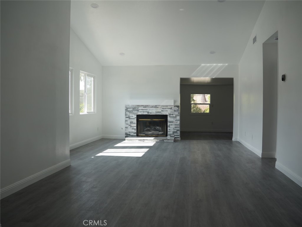 14744 Marymount Street Moorpark, CA 93021 - Photo 10 of 32 a view of empty room with a fireplace