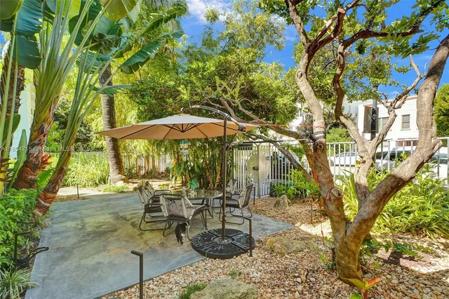 a plant is in front of a house