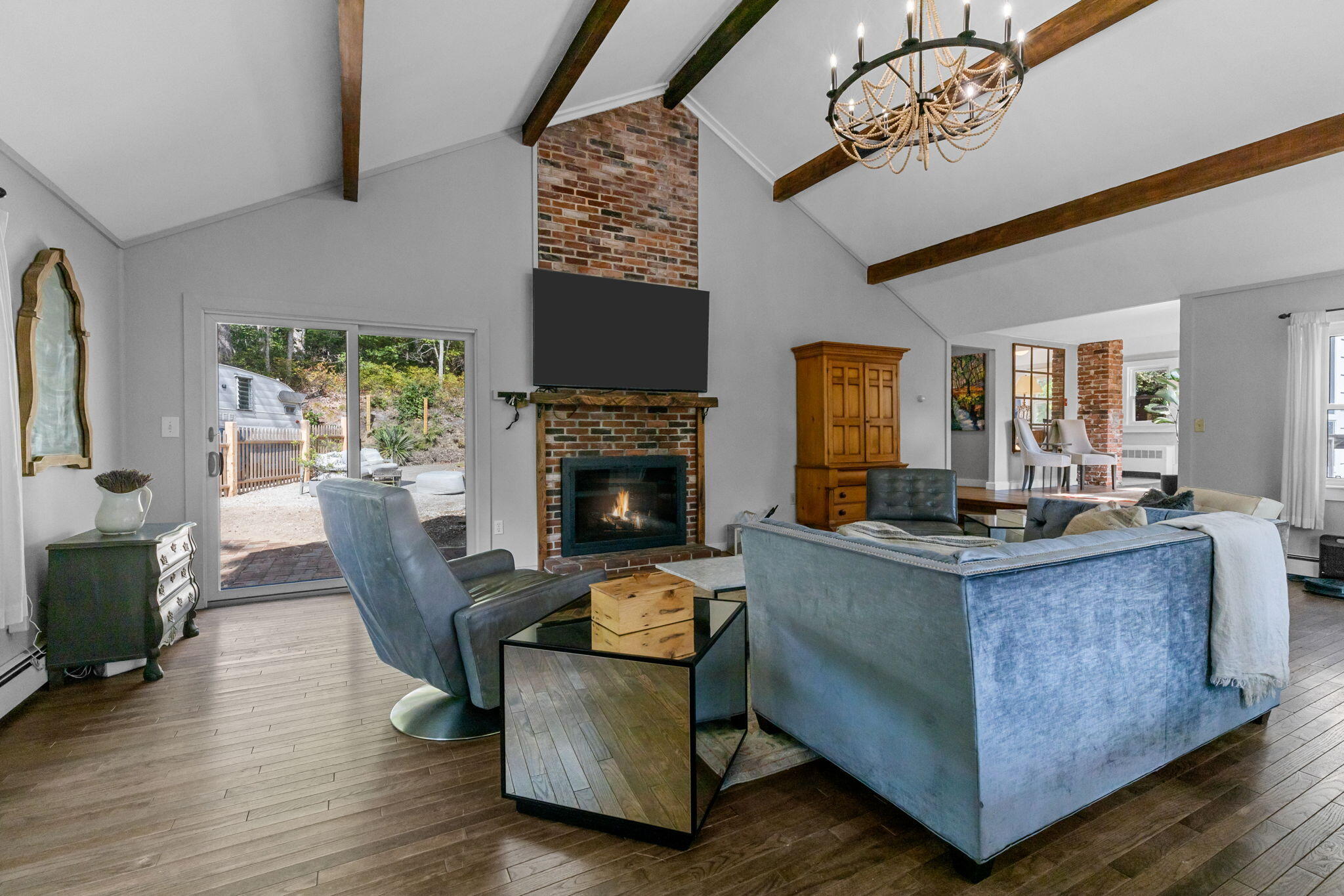 90 Paine Hollow Road Wellfleet, MA 02667 - Photo 15 of 30 a living room with furniture and a fireplace