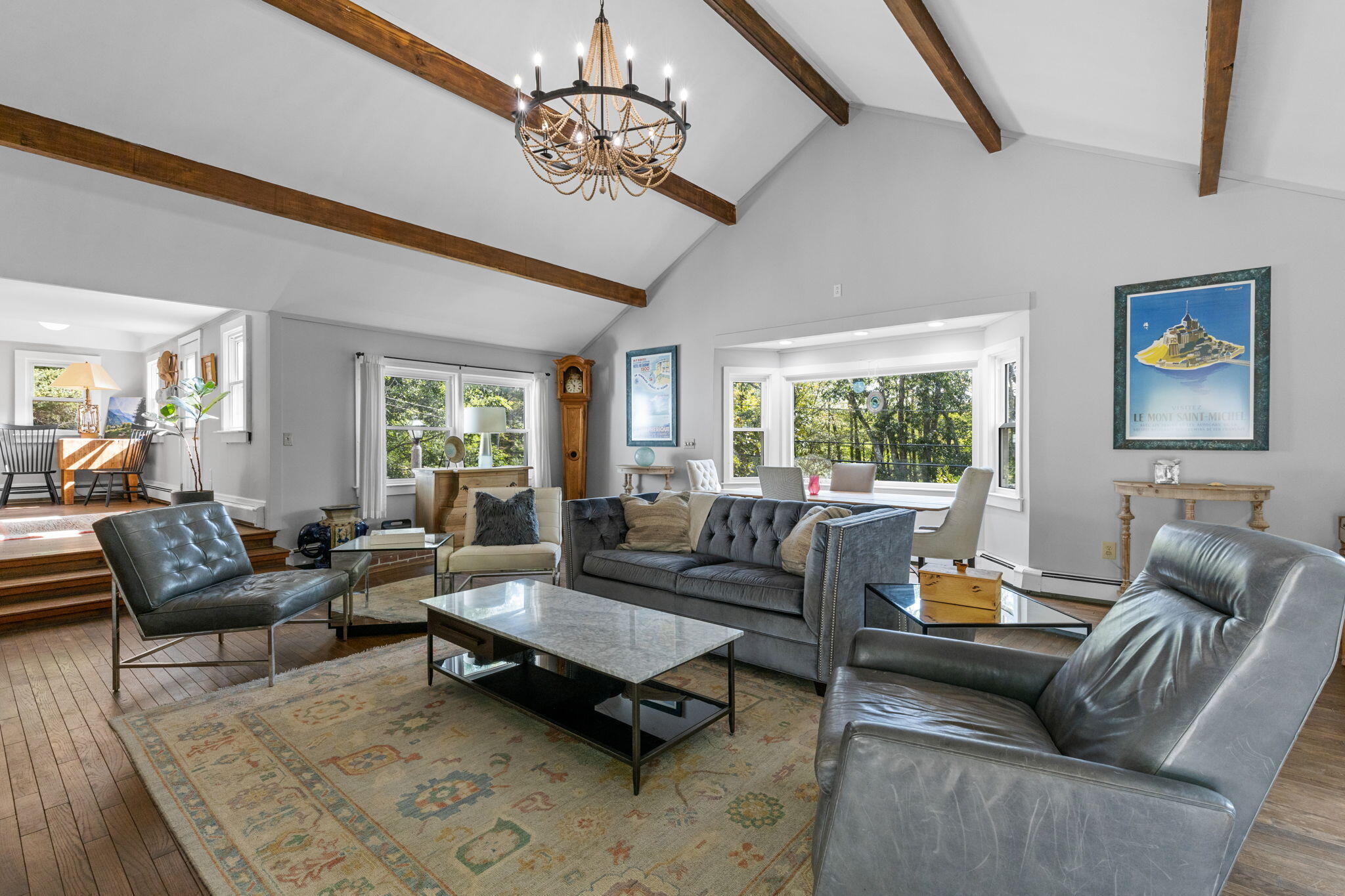90 Paine Hollow Road Wellfleet, MA 02667 - Photo 17 of 30 a living room with furniture wooden floor and a chandelier