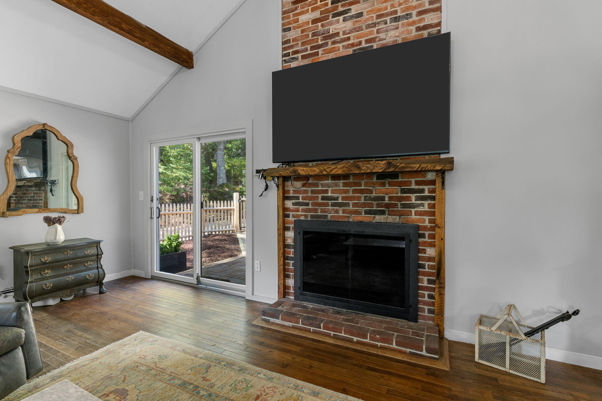 90 Paine Hollow Road Wellfleet, MA 02667 - Photo 20 of 30 a living room with furniture and a fireplace