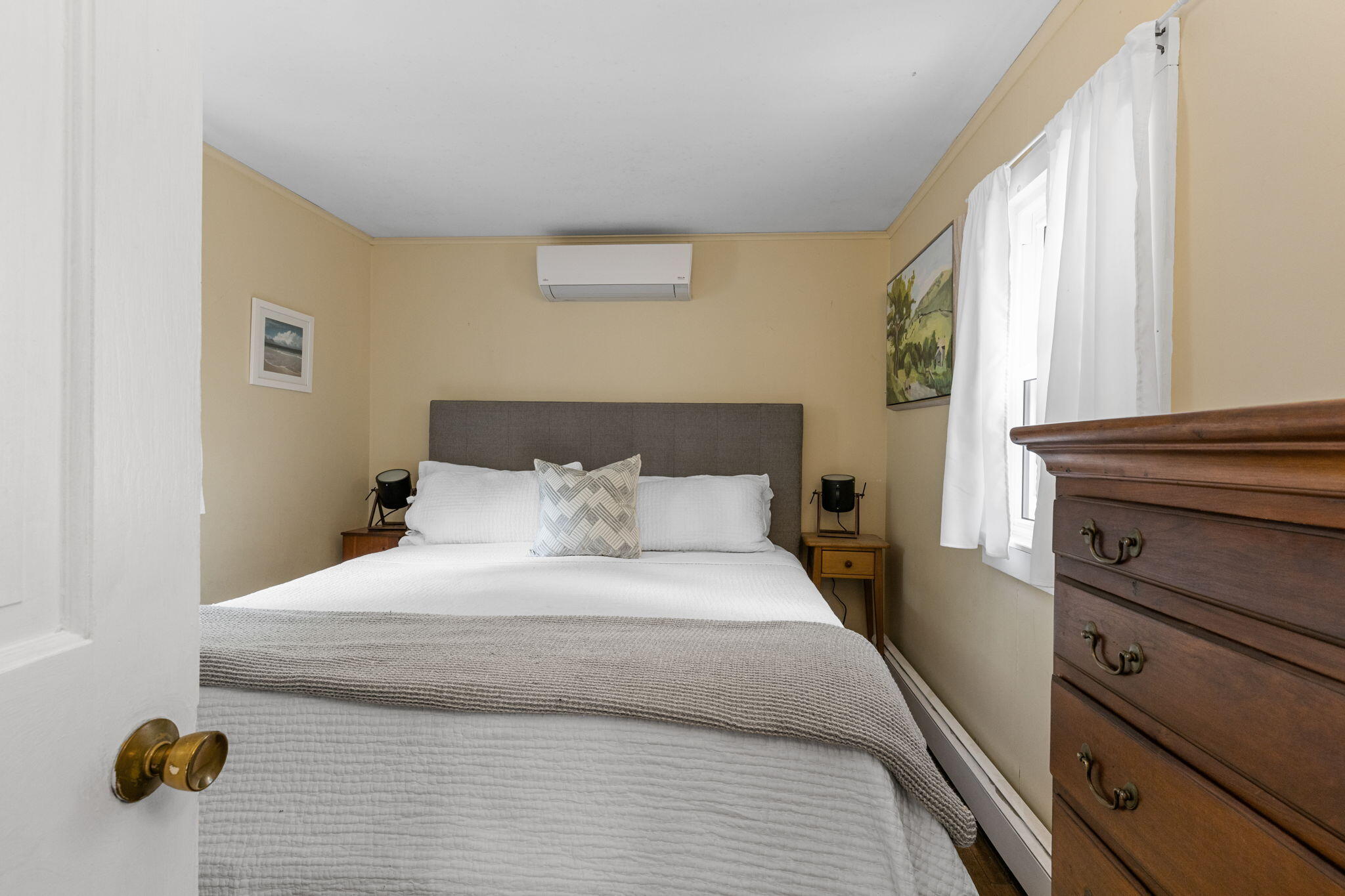 90 Paine Hollow Road Wellfleet, MA 02667 - Photo 24 of 30 a bedroom with a bed and window