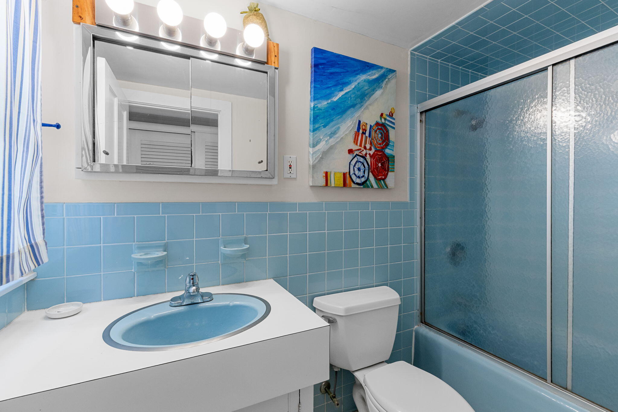 90 Paine Hollow Road Wellfleet, MA 02667 - Photo 25 of 30 a bathroom with a sink a toilet and shower