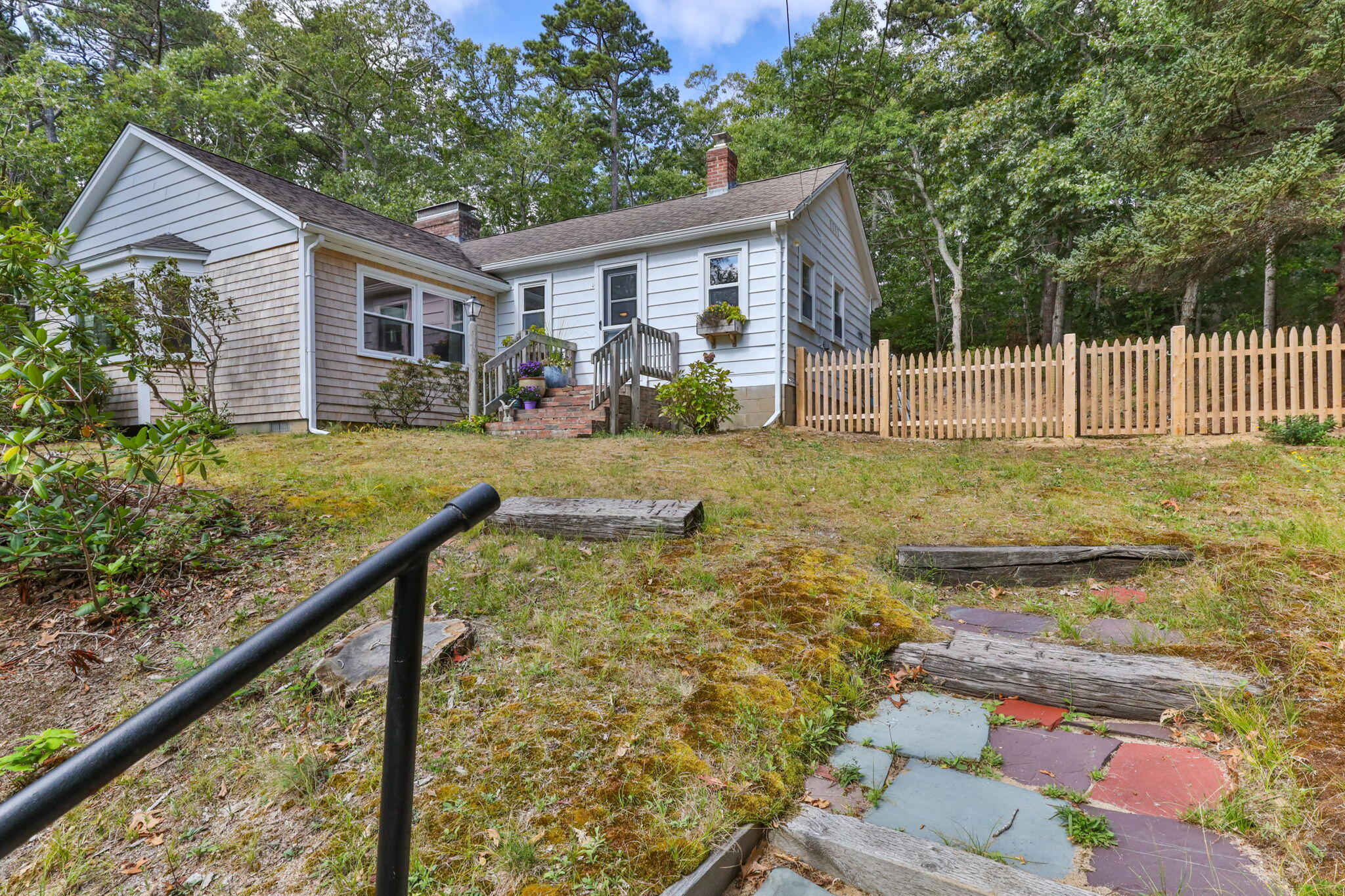 90 Paine Hollow Road Wellfleet, MA 02667 - Photo 4 of 30 a view of an house with backyard space and balcony
