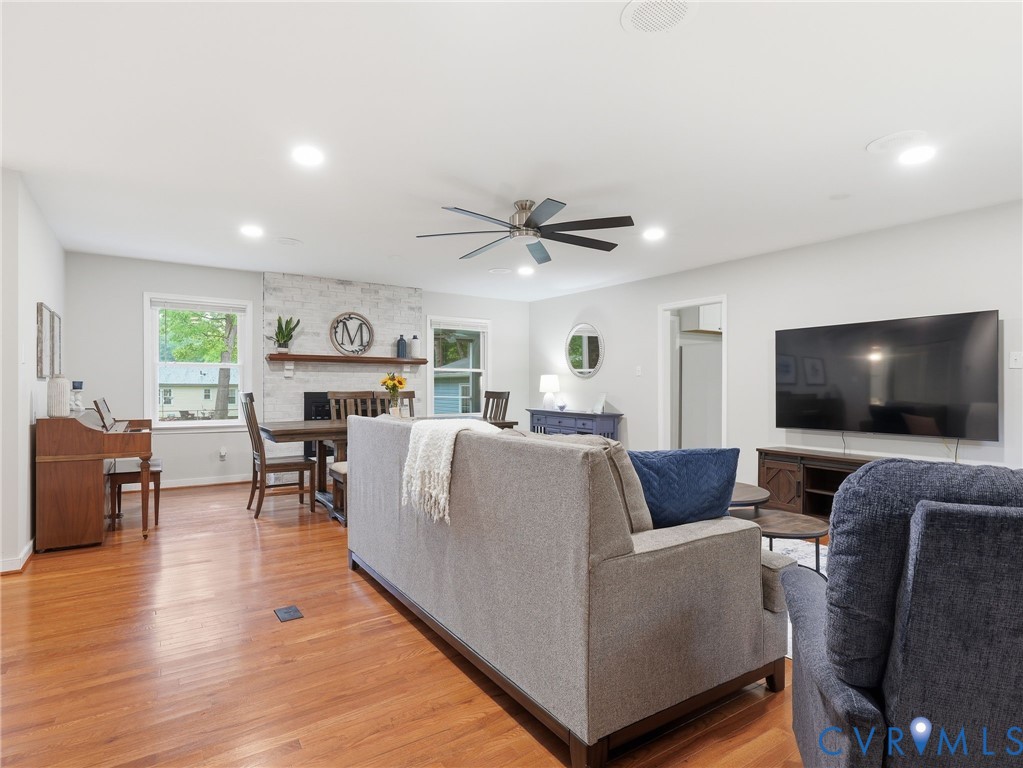 7707 Woodbrook Road Quinton, VA 23141 - Photo 13 of 42 Open-concept living space featuring wood-finish fl