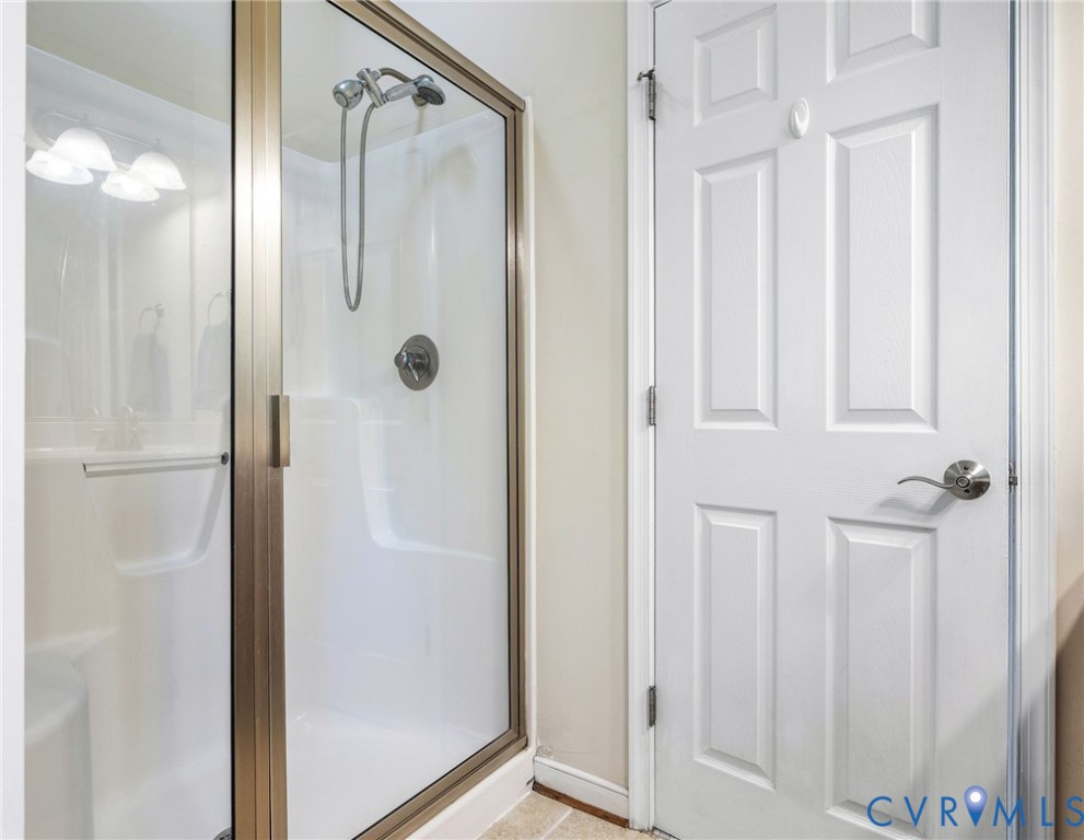 13532 Baycraft Terrace Midlothian, VA 23112 - Photo 19 of 28 a bathroom with a glass shower door
