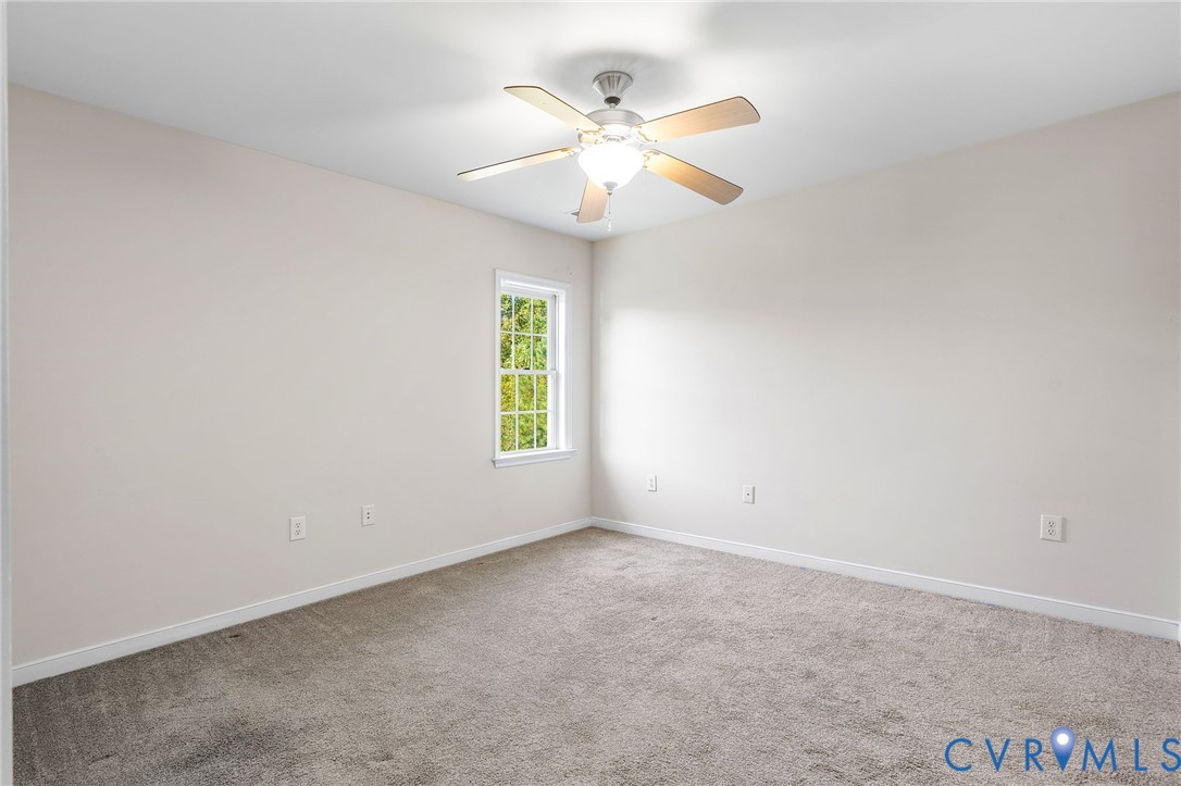13532 Baycraft Terrace Midlothian, VA 23112 - Photo 26 of 28 an empty room with windows and fan