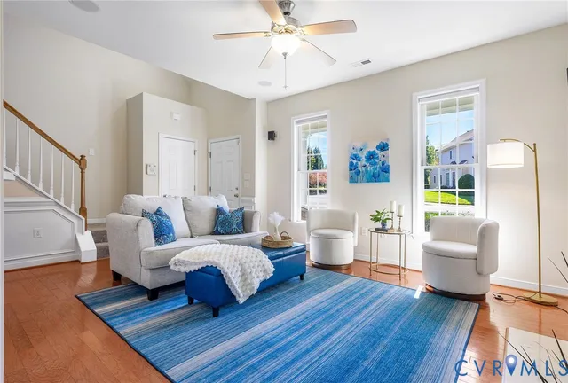 a kitchen with a sink a table and chairs