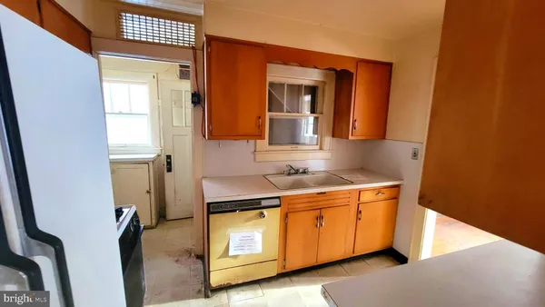 a bathroom with a sink a mirror and vanity