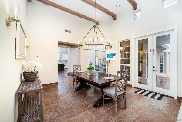a spacious bathroom with a granite countertop sink mirror and a