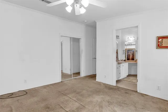 an empty room with a bathroom