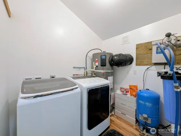 a utility room with dryer and washer
