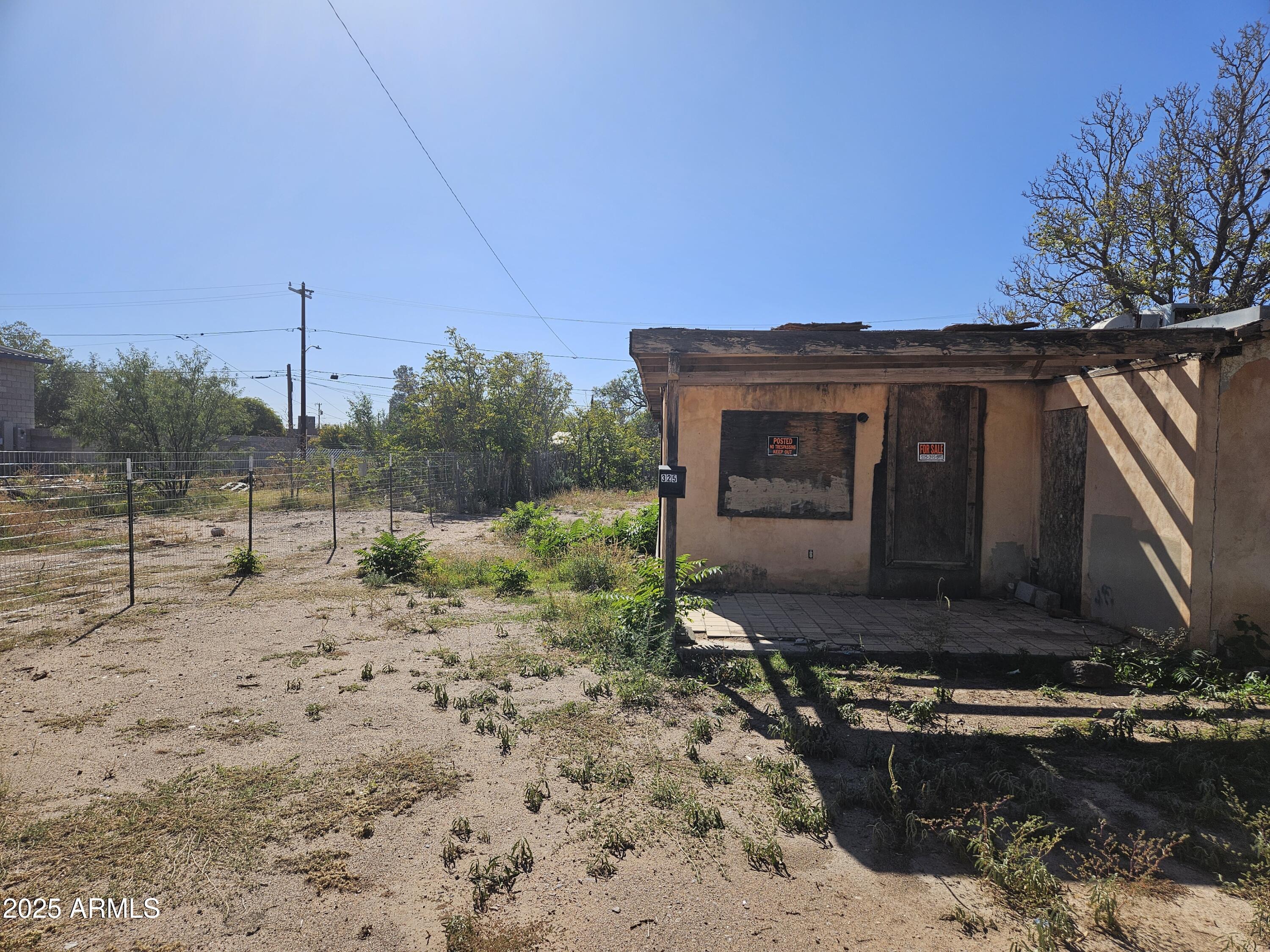 325 East 8th Street Douglas, AZ 85607 - Photo 2 of 13 a view of a house with a yard