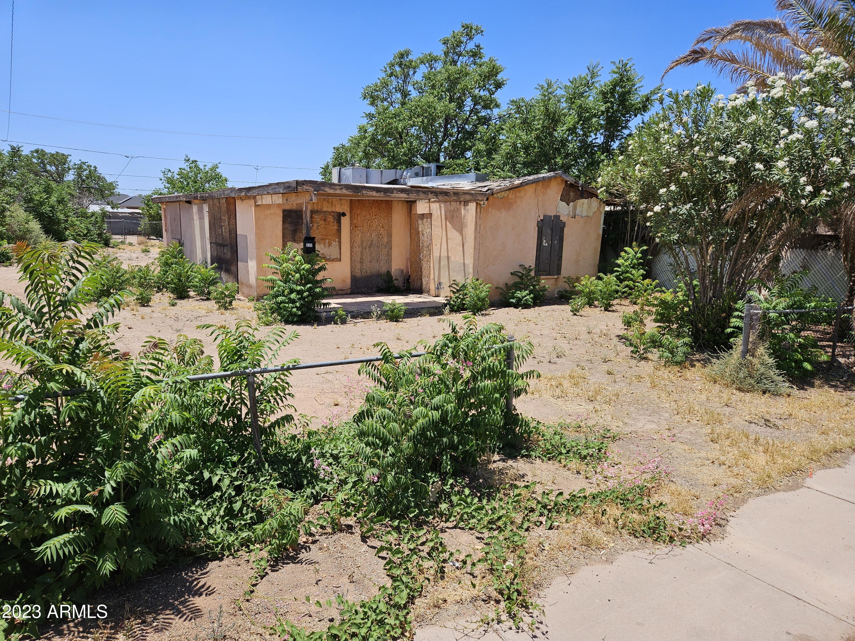 325 East 8th Street Douglas, AZ 85607 - Photo 6 of 13 front view of a house with a yard