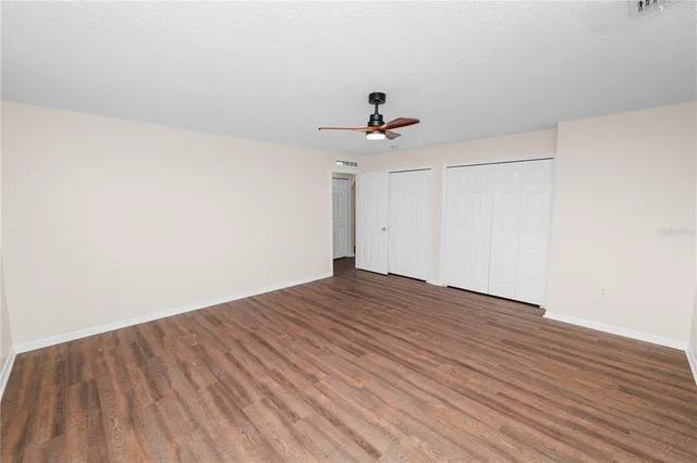 a bathroom with a sink a mirror and a shower