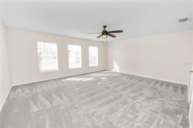 a bathroom with a shower and a toilet
