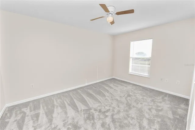 a view of a house with a big yard