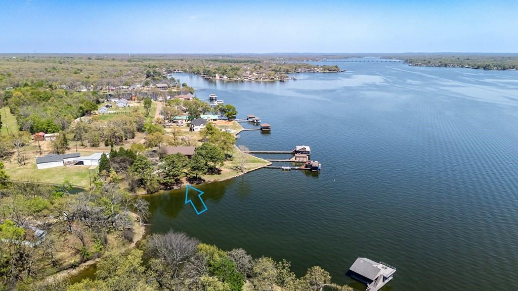 229 Esquire Estates Road Mabank, TX 75156 - Photo 7 of 19 an aerial view of ocean with residential houses with outdoor space