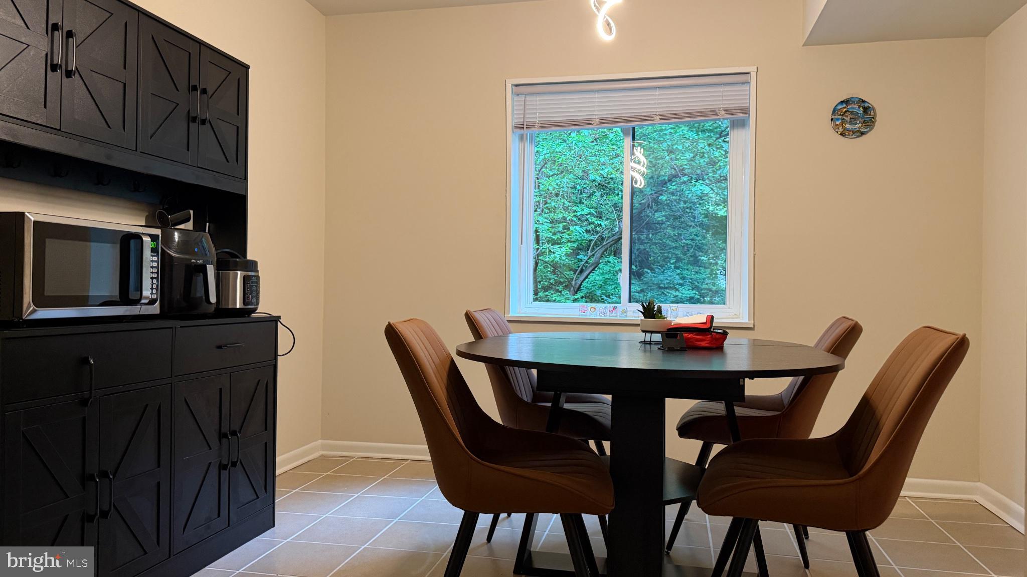 1407 Northgate Square, Unit 2C Reston, VA 20190 - Photo 12 of 18 Cozy dining nook with nature views.