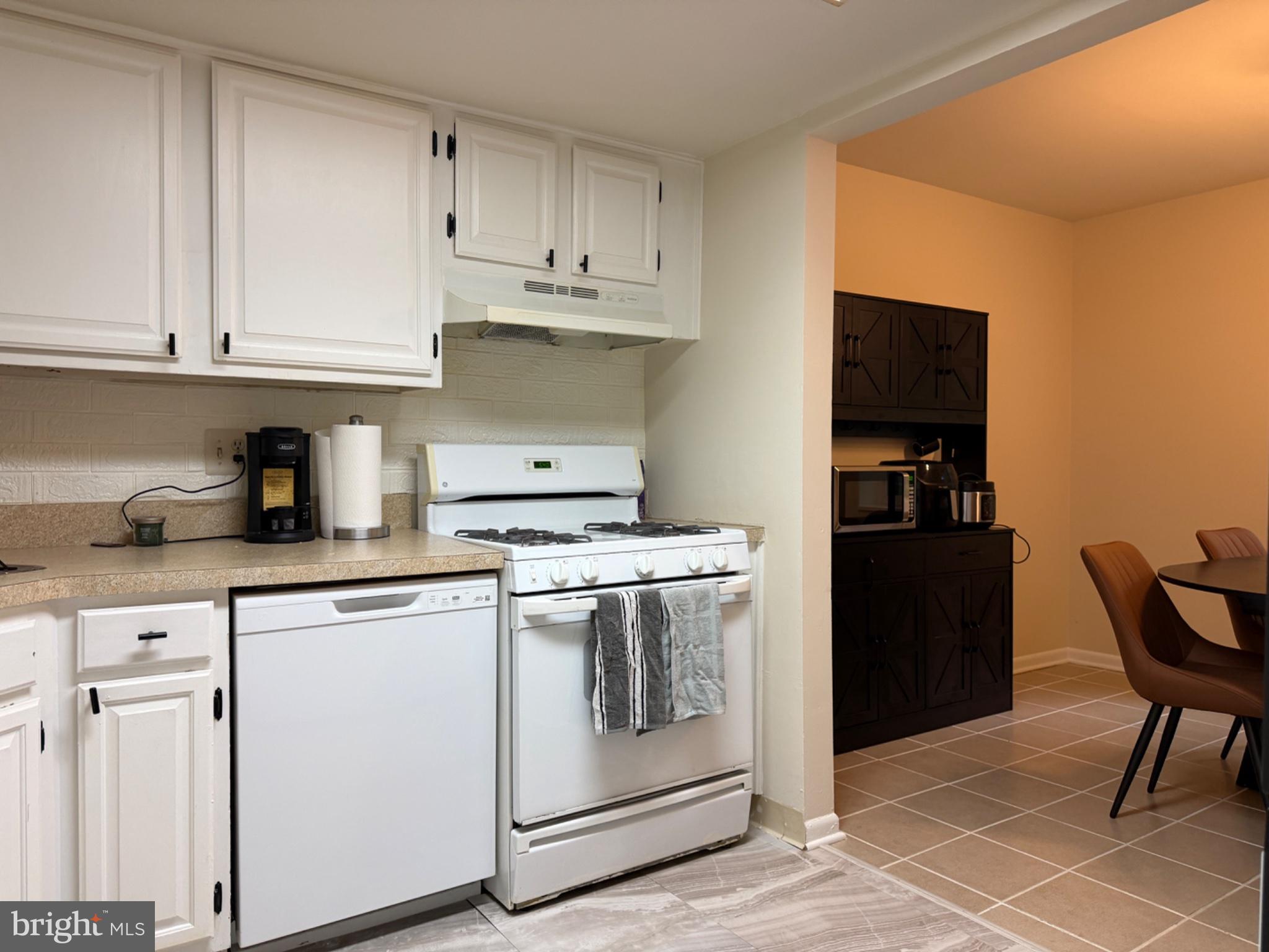 1407 Northgate Square, Unit 2C Reston, VA 20190 - Photo 14 of 18 Modern kitchen with sleek finishes.