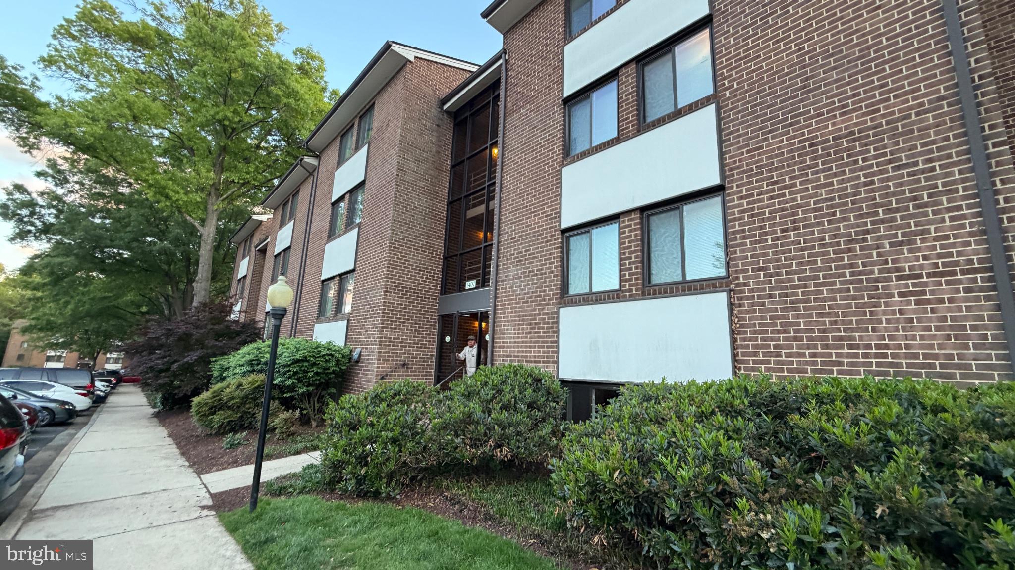 1407 Northgate Square, Unit 2C Reston, VA 20190 - Photo 18 of 18 Charming brick apartment exterior.