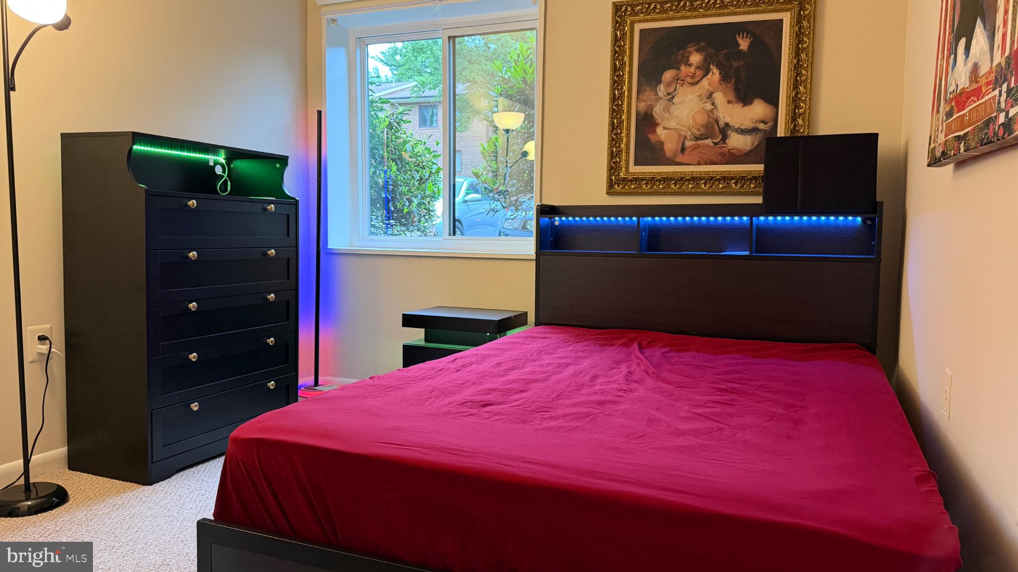 1407 Northgate Square, Unit 2C Reston, VA 20190 - Photo 7 of 18 Modern bedroom with vibrant accents.