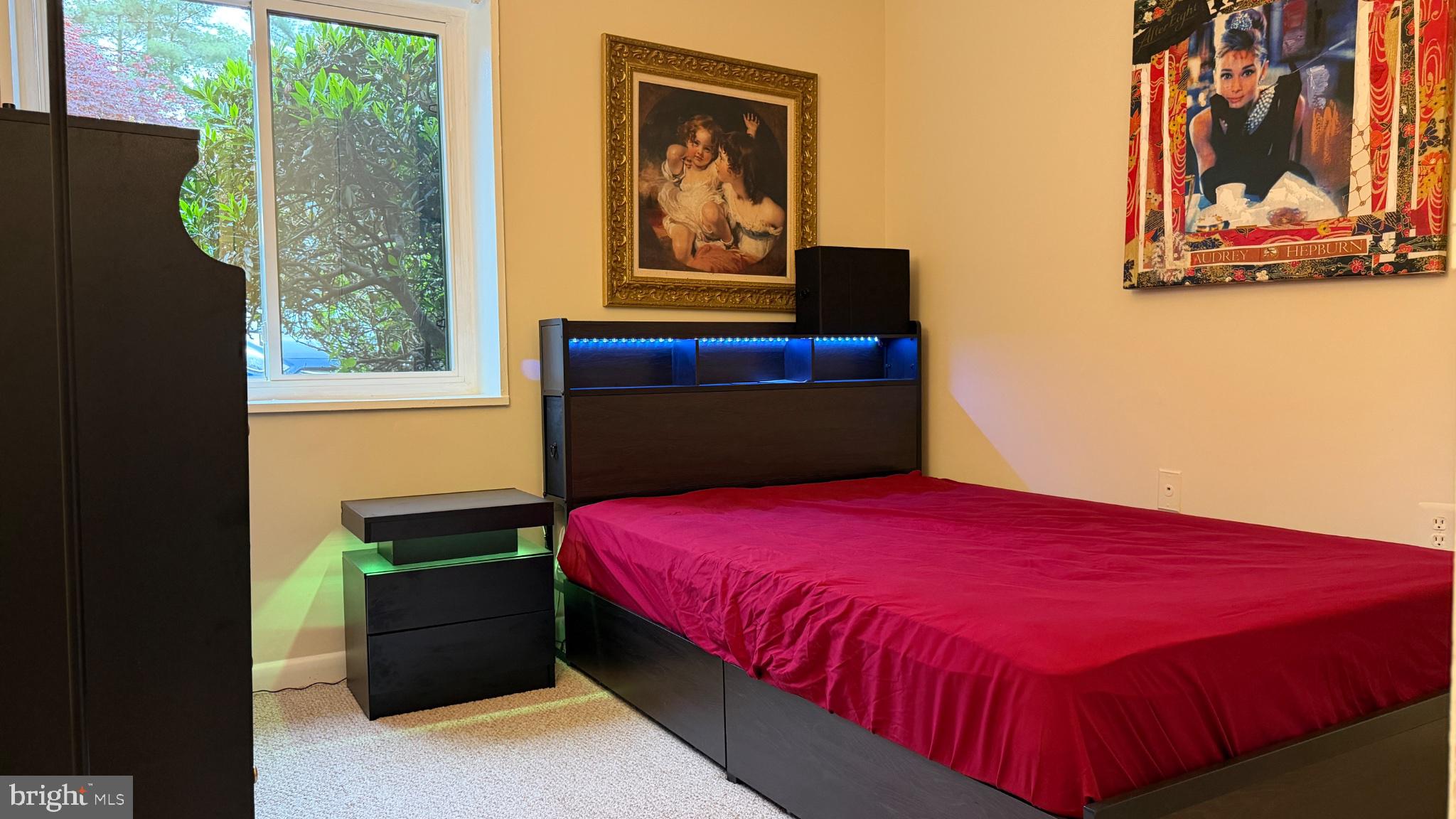1407 Northgate Square, Unit 2C Reston, VA 20190 - Photo 8 of 18 Modern bedroom with vibrant decor.